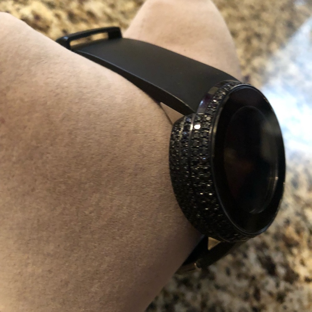Gucci watch with black diamonds